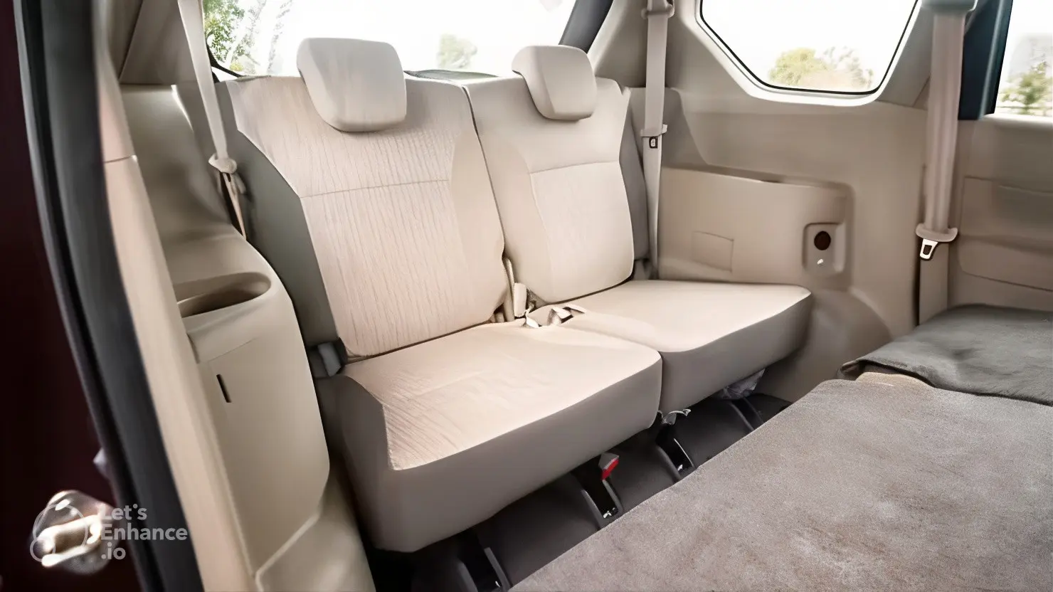 SelectBus Ertiga interior with third-row seats, perfect for Kokna trip tours